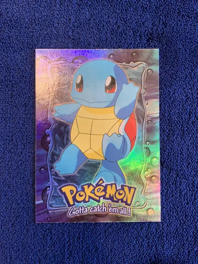 Squirtle [Rainbow Foil] - Pokemon 1999 Topps Movie Evolution #E7