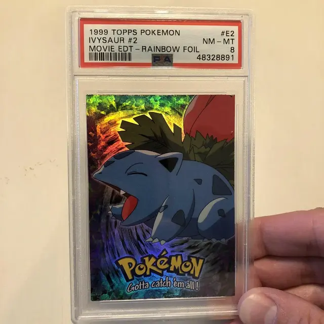 Ivysaur [Rainbow Foil] - Pokemon 1999 Topps Movie Evolution #E2