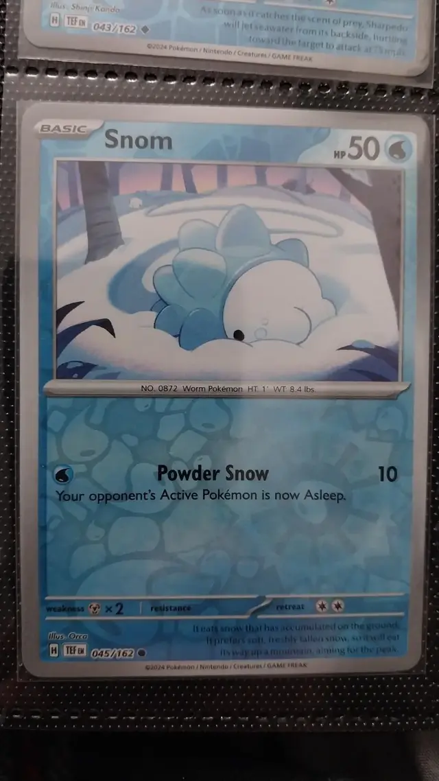 Snom [Reverse Holo]