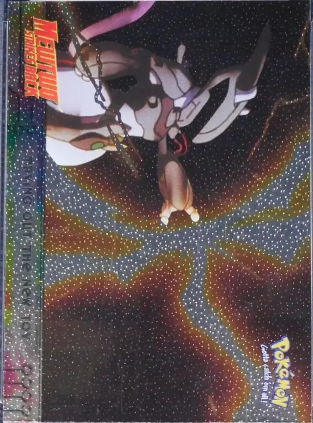 Trying Out the New Toy [Foil] #7 - Pokemon 1999 Topps Movie