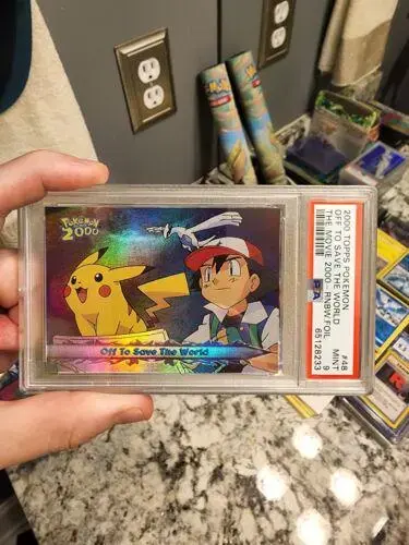Off to Save the World [Rainbow Foil] #48 - Pokemon 2000 Topps Movie