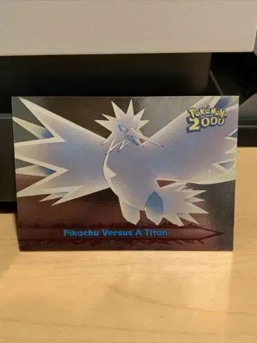 Pikachu Versus a Titan #34 - Pokemon 2000 Topps Movie
