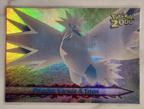 Pikachu Versus a Titan [Rainbow Foil] #34 - Pokemon 2000 Topps Movie